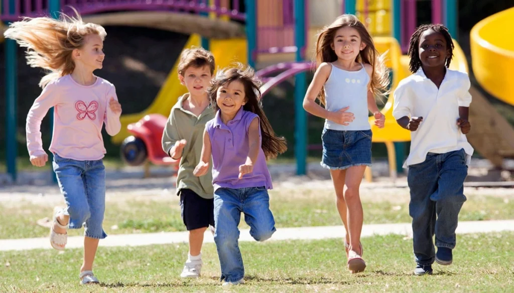 children running in a playground