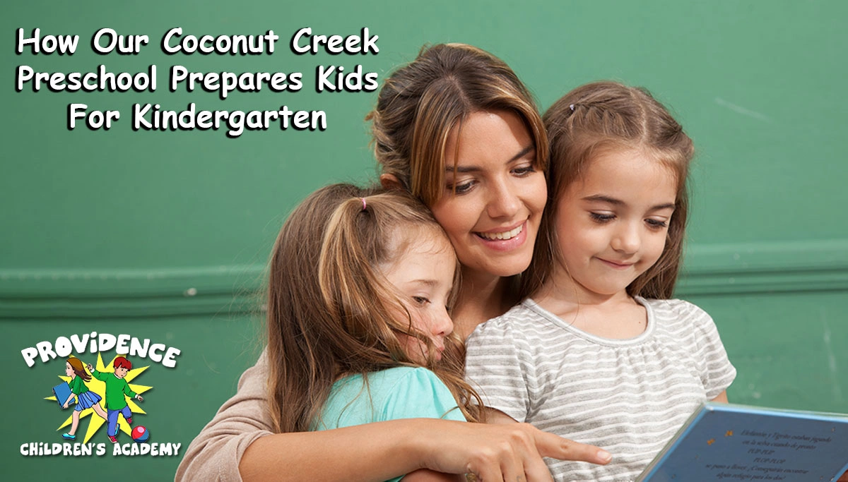 teacher reads a storybook to two young girls