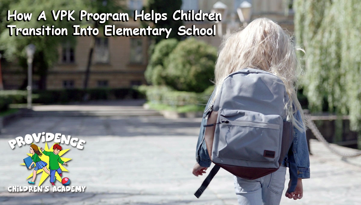 A little girl walking to school while wearing a backpack